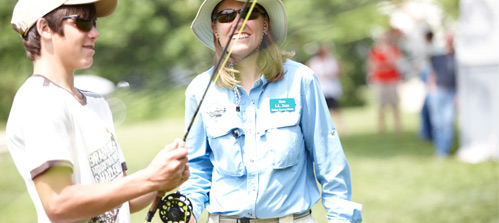 L.L.Bean Outdoor Discovery Schools. NEW L.L.Bean Teen Adventures. A teen camper learning how to fish with an L.L.Bean fly-fishing instructor.